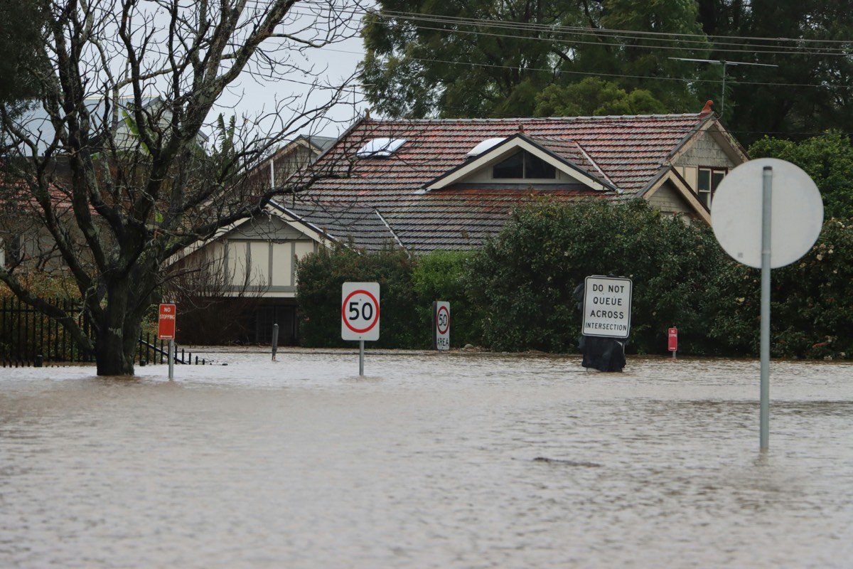 A house surrounded by floodwater